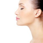Profile portrait of female face with clean skin